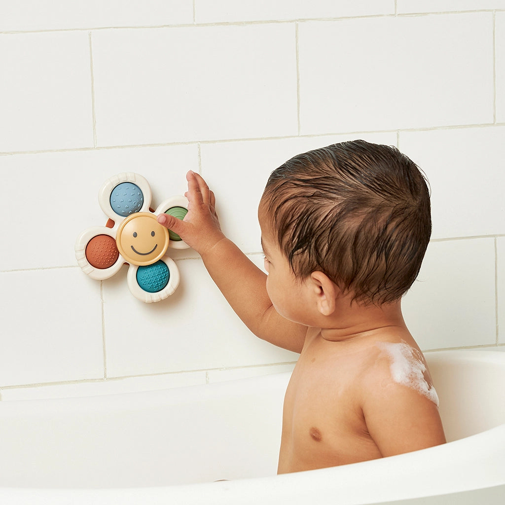 Itzy Pop & Whirl™ - Bath + Travel Toy - Smiles