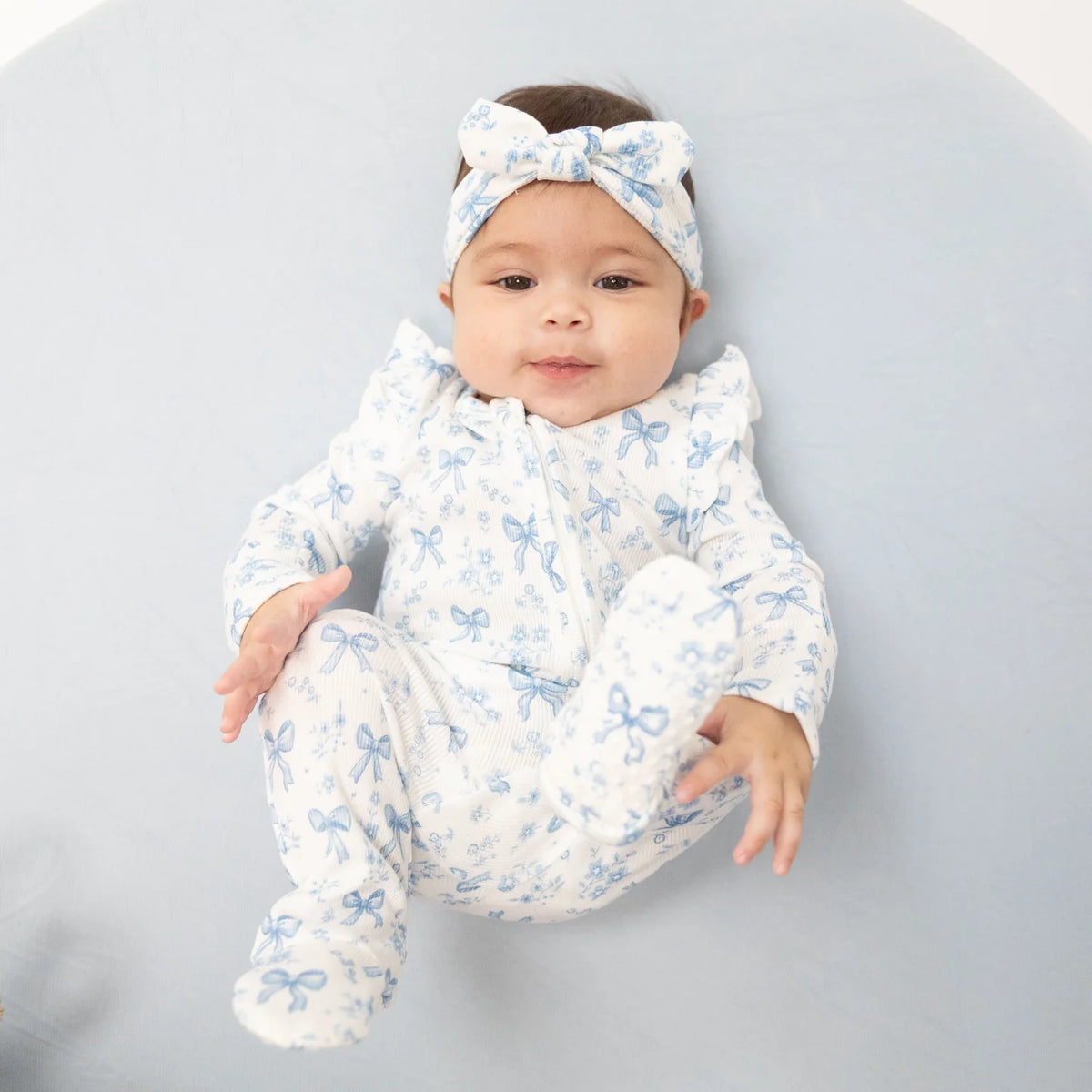 Ruffle Sleeve Zippered Footie- Blue Bows & Flowers